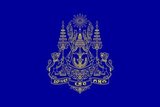 The royal standard of Cambodia bears the royal coat of arms on a dark blue field. Depicted on the coat of arms are two animals which are a gajasingha (a lion with an elephant trunk) on the left, and a singha, or a lion, on the right. Supported by the animals are two royal five-tiered umbrellas. In between is a royal crown with a ray of light at its top.