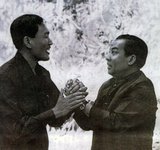 Between 1970 and 1975 Norodom Sihanouk was nominally head of the Khmer Rouge-dominated Royal Government of National Union of Kampuchea (acronym from the French GRUNK), the opposition to Lon Nol's pro-American Khmer Republic.  In 1973 he travelled from Beijing to the Khmer Rouge 'liberated zone' of Cambodia for propaganda purposes.<br/><br/>

The Khmer Rouge, or Communist Party of Kampuchea, ruled  Cambodia from 1975 to 1979, led by Pol Pot, Nuon Chea, Ieng Sary, Son Sen and Khieu Samphan. It is remembered primarily for its brutality and policy of social engineering which resulted in millions of deaths. Its attempts at agricultural reform led to widespread famine, while its insistence on absolute self-sufficiency, even in the supply of medicine, led to the deaths of thousands from treatable diseases (such as malaria). Brutal and arbitrary executions and torture carried out by its cadres against perceived subversive elements, or during purges of its own ranks between 1976 and 1978, are considered to have constituted a genocide. Several former Khmer Rouge cadres are currently on trial for war crimes in Phnom Penh.