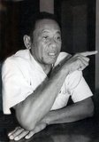 Ke Pauk, sometimes known as  'Brother Number 13', was secretary of the Northern Zone and a member of the Standing Committee of the Khmer Rouge Central Committee (Party Centre) during its period of power (1975-1979). He died, apparently of natural causes, at Anlong Veng in 2002.<br/><br/>

The Khmer Rouge, or Communist Party of Kampuchea, ruled  Cambodia from 1975 to 1979, led by Pol Pot, Nuon Chea, Ieng Sary, Son Sen and Khieu Samphan. It is remembered primarily for its brutality and policy of social engineering which resulted in millions of deaths. Its attempts at agricultural reform led to widespread famine, while its insistence on absolute self-sufficiency, even in the supply of medicine, led to the deaths of thousands from treatable diseases (such as malaria). Brutal and arbitrary executions and torture carried out by its cadres against perceived subversive elements, or during purges of its own ranks between 1976 and 1978, are considered to have constituted a genocide. Several former Khmer Rouge cadres are currently on trial for war crimes in Phnom Penh.
