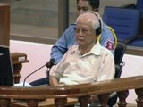 Khieu Samphan at a public hearing before the Pre-Trial Chamber in the Extraordinary Chambers in the Courts of Cambodia on 3 July 2009. Image Courtesy of Extraordinary Chambers in the Courts of Cambodia.<br/><br/>

The Khmer Rouge, or Communist Party of Kampuchea, ruled Cambodia from 1975 to 1979, led by Pol Pot, Nuon Chea, Ieng Sary, Son Sen and Khieu Samphan. It is remembered primarily for its brutality and policy of social engineering which resulted in millions of deaths. Its attempts at agricultural reform led to widespread famine, while its insistence on absolute self-sufficiency, even in the supply of medicine, led to the deaths of thousands from treatable diseases (such as malaria). Brutal and arbitrary executions and torture carried out by its cadres against perceived subversive elements, or during purges of its own ranks between 1976 and 1978, are considered to have constituted a genocide. Several former Khmer Rouge cadres are currently on trial for war crimes in Phnom Penh.